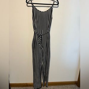 Navy and white striped jumpsuit. Size medium